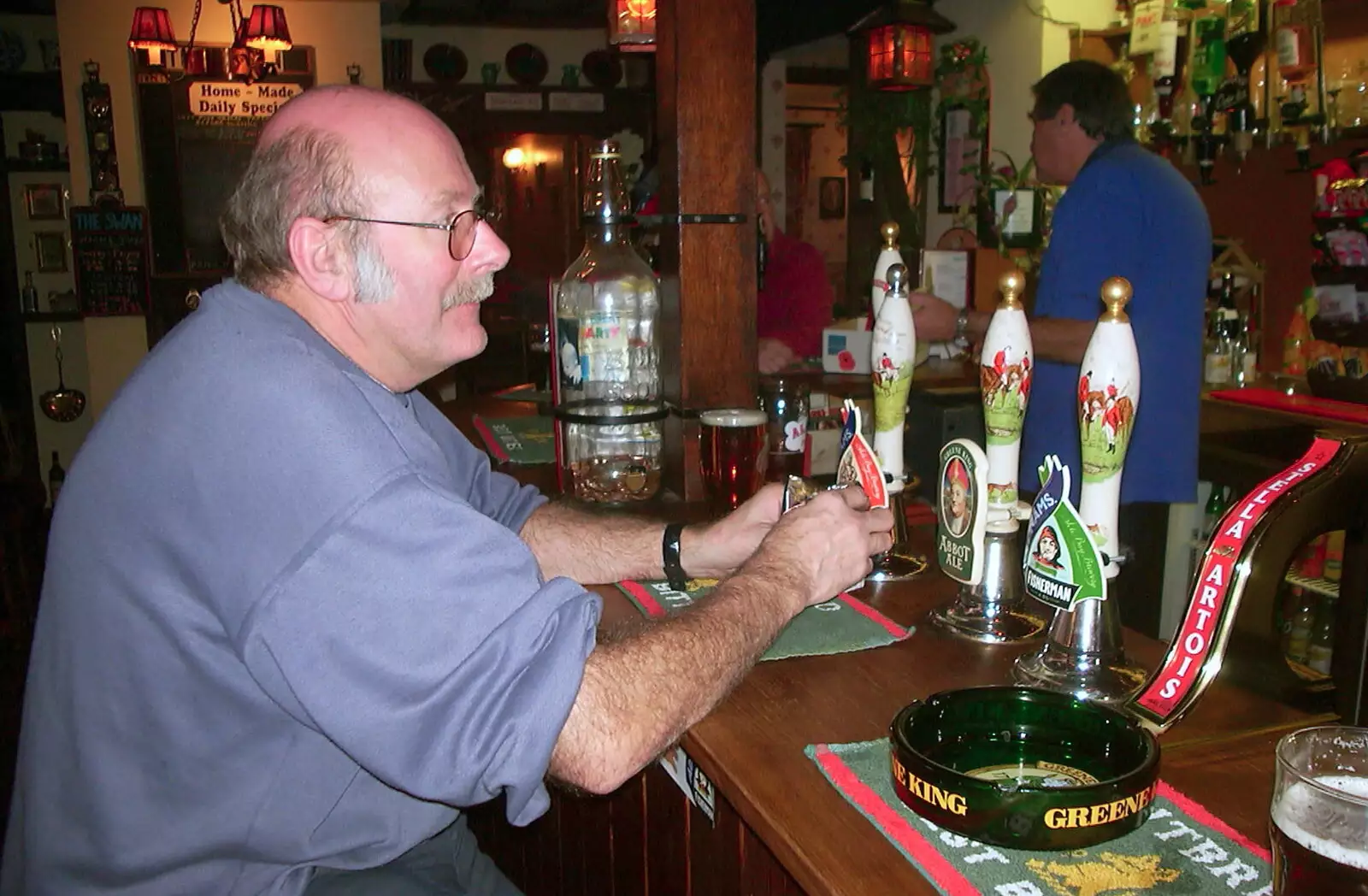 Meanwhile, Bindery Dave is at the bar, from A BSCC Presentation, Brome Swan, Suffolk - 9th November 2002