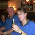 Suey looks nonplussed by a bottle of Smirnoff Ice, A BSCC Presentation, Brome Swan, Suffolk - 9th November 2002