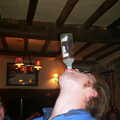 Marc chugs a bottle of Smirnoff Ice, A BSCC Presentation, Brome Swan, Suffolk - 9th November 2002