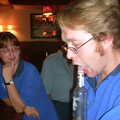 ...and then holds the bottle up with his tongue and a vacuum, A BSCC Presentation, Brome Swan, Suffolk - 9th November 2002