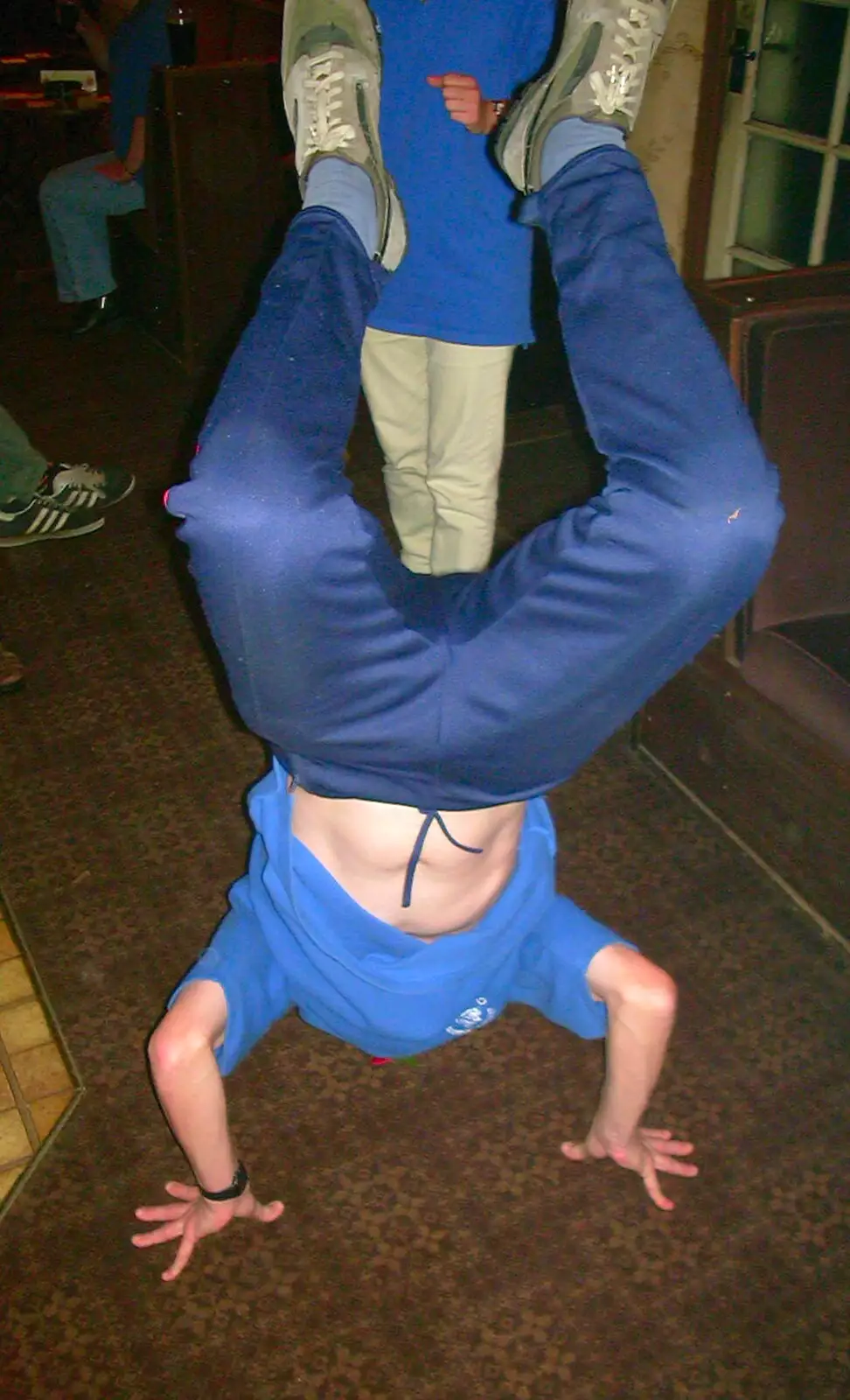 Someone does a head-stand, from A BSCC Presentation, Brome Swan, Suffolk - 9th November 2002