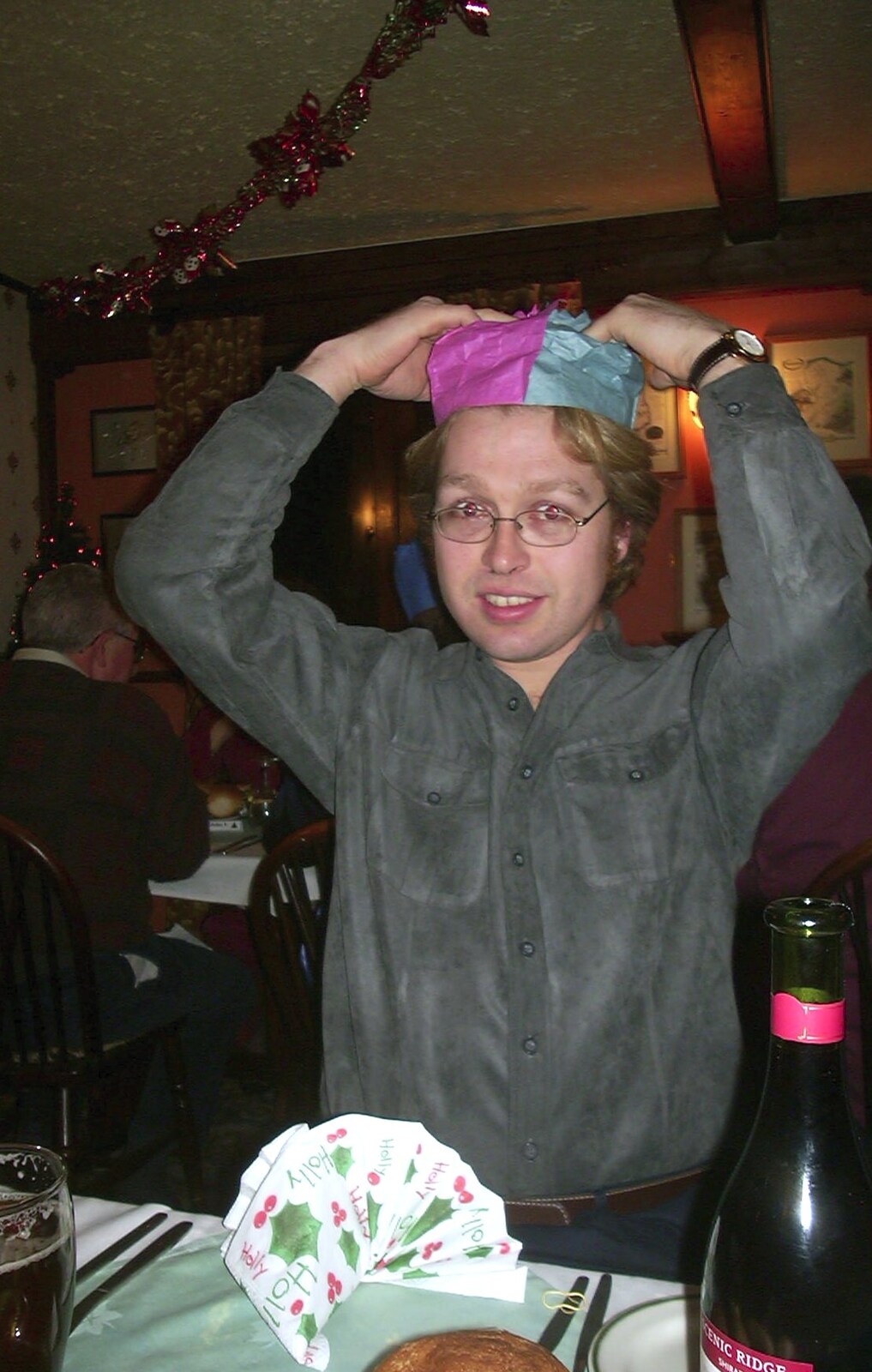 Marc sticks a paper hat on from The BSCC Christmas Dinner, Brome Swan, Suffolk - 10th December 2002