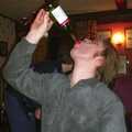 Marc finishes off the bottle, The BSCC Christmas Dinner, Brome Swan, Suffolk - 10th December 2002
