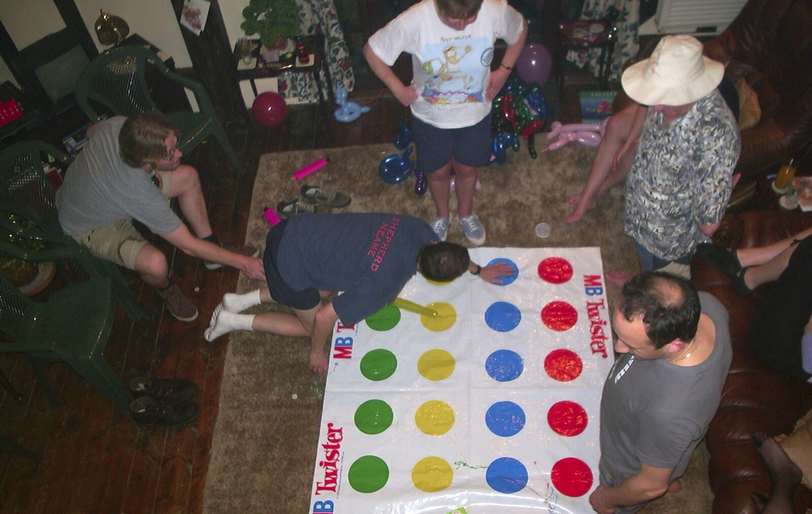 A game of Twister breaks out from Nigel and Jenny's Winter Barbeque, Thrandeston, Suffolk - 15th Decemeber 2002