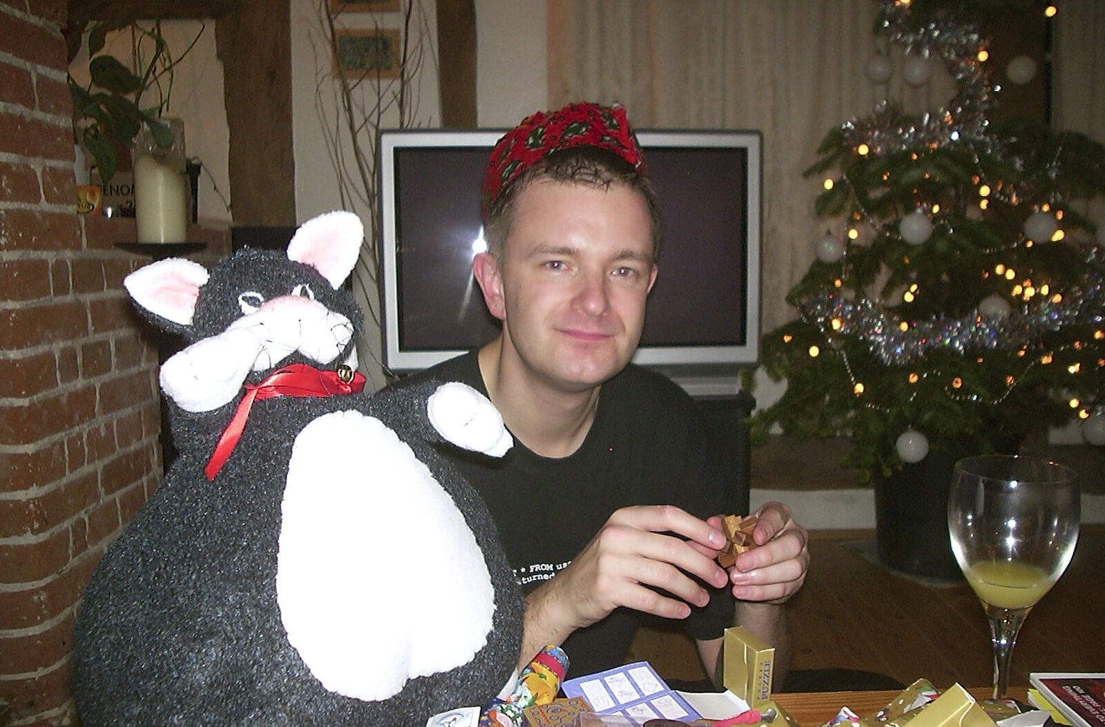 Nosher with a cat-shaped door stop from Christmas Day at Nosher's, Brome, Suffolk - 25th December 2002