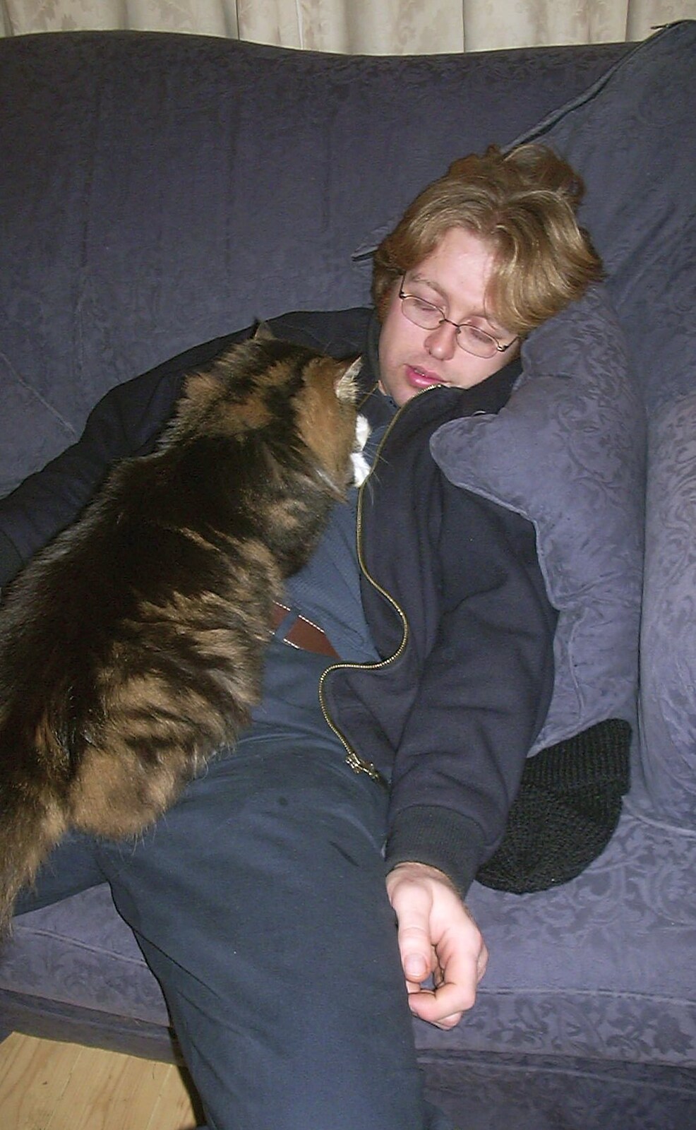 Marc has a sleep with Sophie the cat from Christmas Day at Nosher's, Brome, Suffolk - 25th December 2002