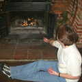 2002 Pippa pokes at one of Alan's legendary stick fires