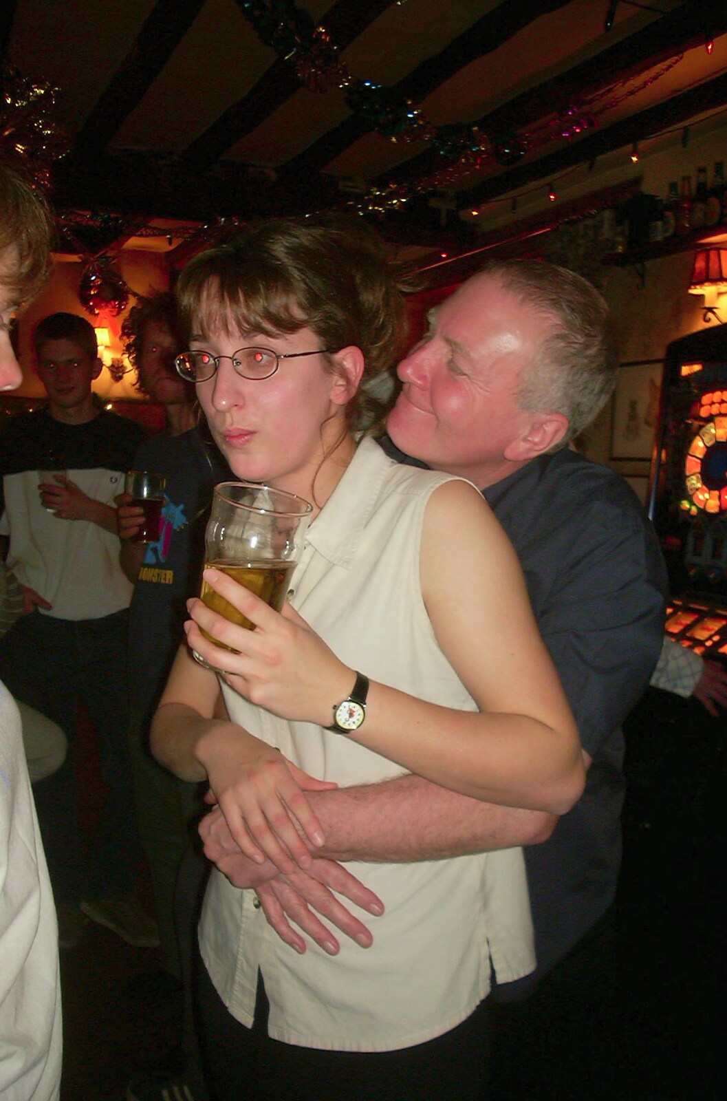 New Year's Eve at the Swan Inn, Brome, Suffolk - 31st December 2002: John Willy grabs Suey from behind