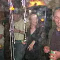 DH in a miasma of streamers and smoke, New Year's Eve at the Swan Inn, Brome, Suffolk - 31st December 2002