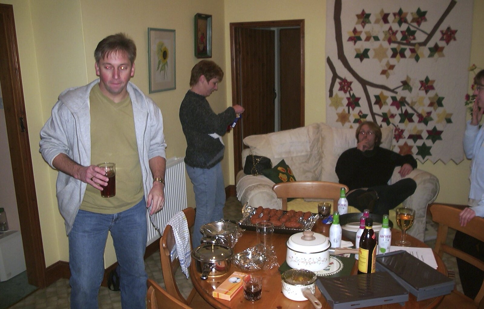 Nigel roams around with a pint from Anne's Curry Night, Thorndon, Suffolk - 13th January 2003
