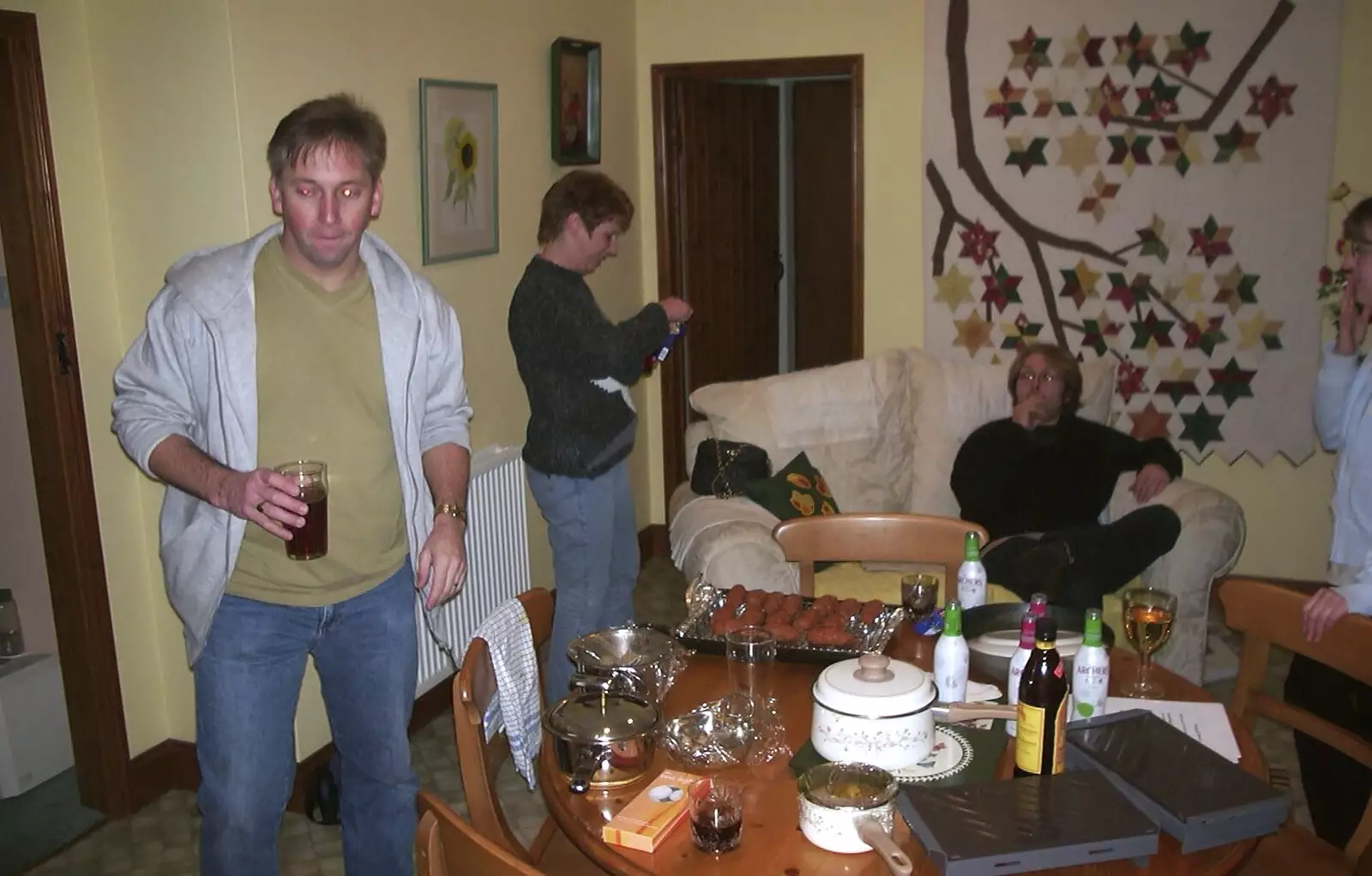 Nigel roams around with a pint, from Anne's Curry Night, Thorndon, Suffolk - 13th January 2003