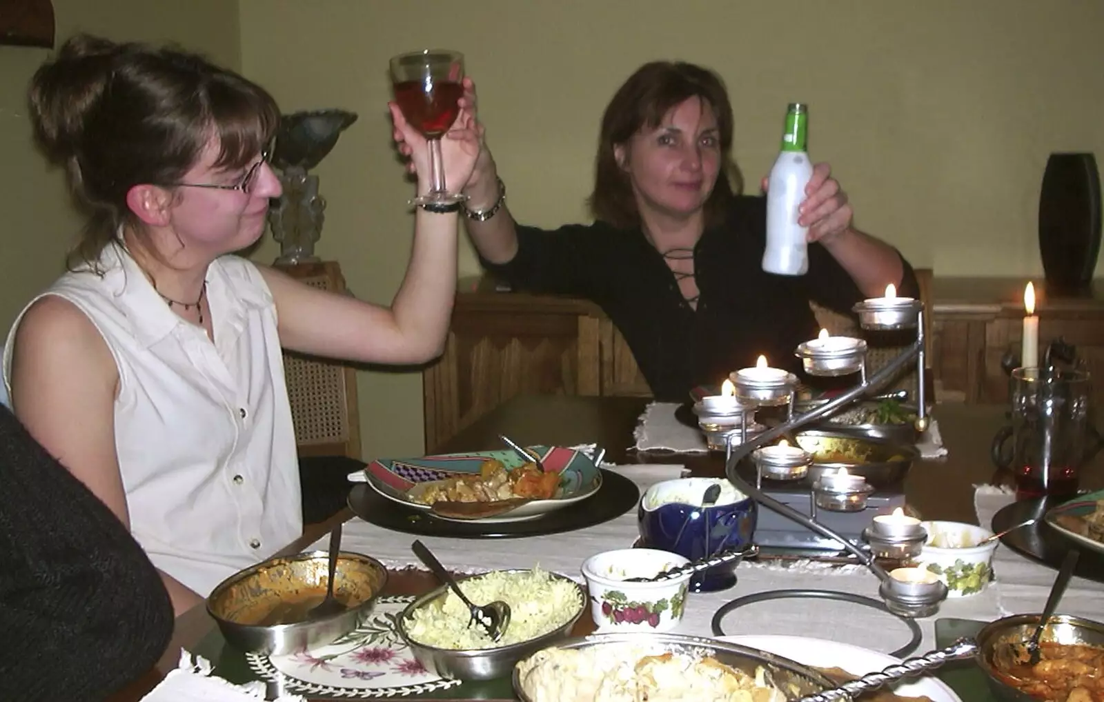 Anne holds up a Smirnoff Ice and Suey's wine, from Anne's Curry Night, Thorndon, Suffolk - 13th January 2003