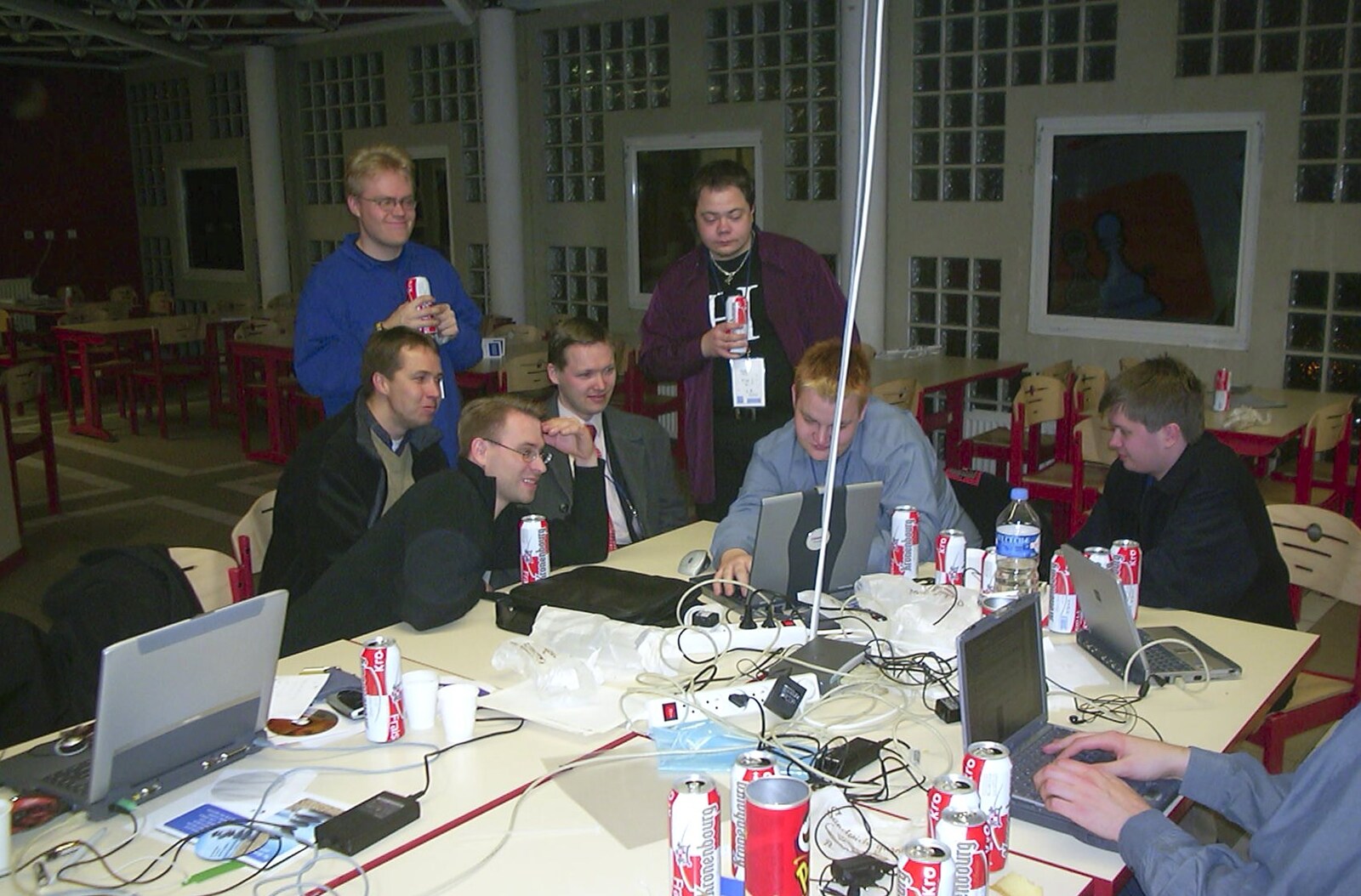Everyone gathers round to look at something running from 3G Lab at the 3GSM Conference, Cannes, France - 17th February 2003