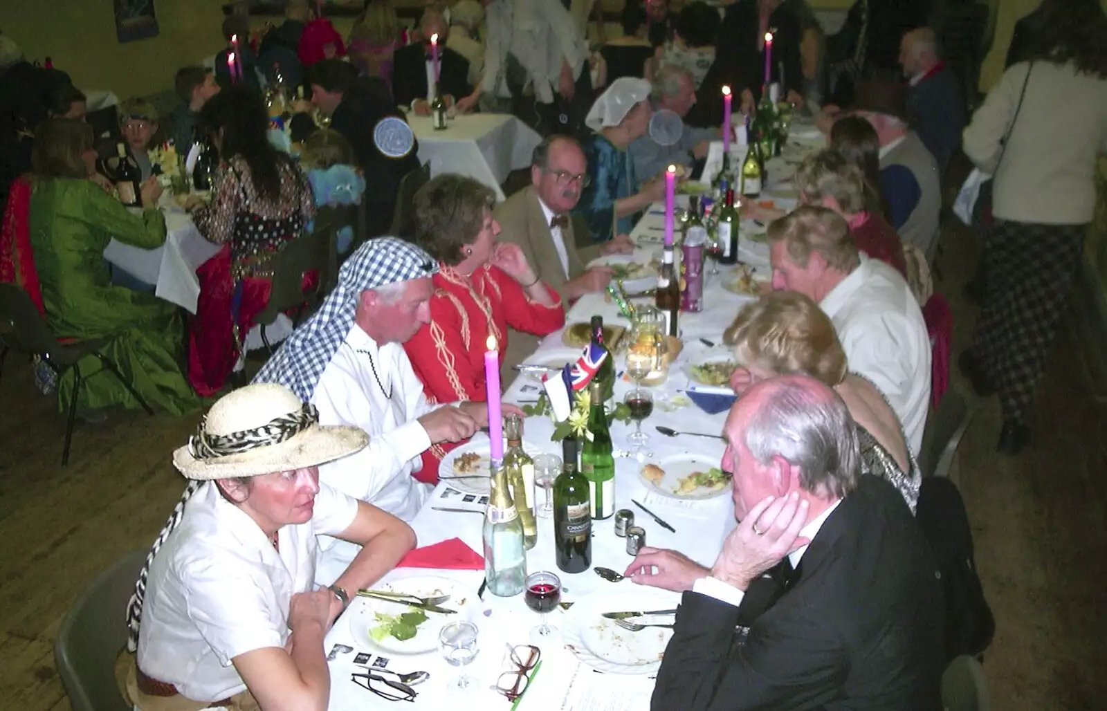 A table of fancy dress people, from The BBs at Eye Town Hall, Eye, Suffolk - 21st March 2003