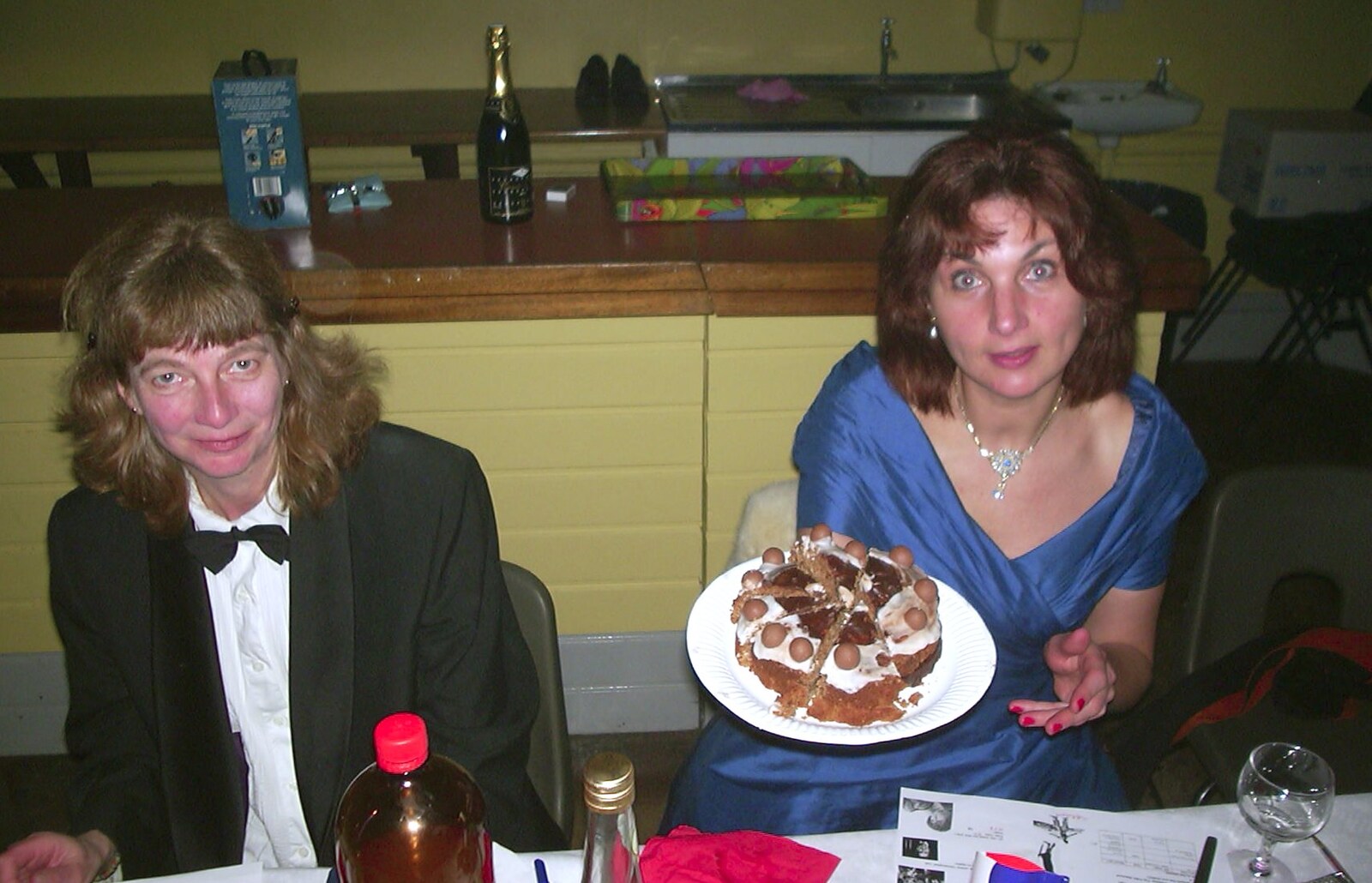 Anne offers up some chocolate cake from The BBs at Eye Town Hall, Eye, Suffolk - 21st March 2003