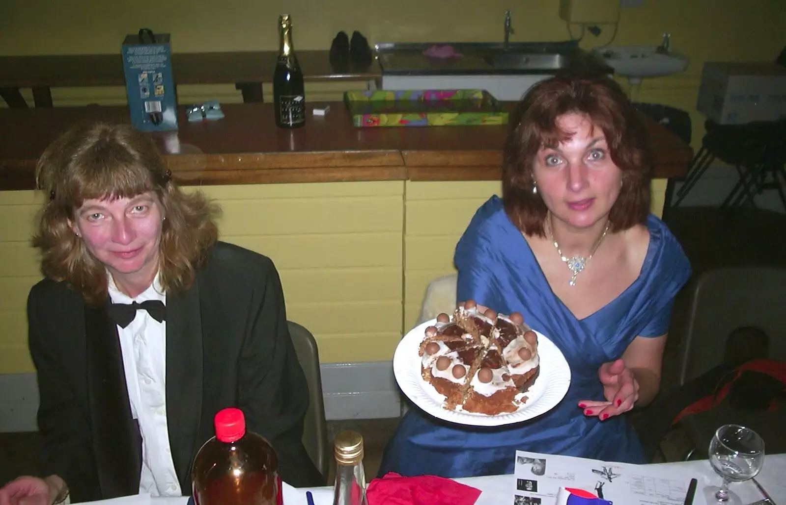 Anne offers up some chocolate cake, from The BBs at Eye Town Hall, Eye, Suffolk - 21st March 2003