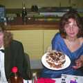 Anne offers up some chocolate cake, The BBs at Eye Town Hall, Eye, Suffolk - 21st March 2003