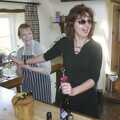 Anne cracks open a bottle of vino, Carolyn on Sunday, Wymondham, Norfolk - 23rd March 2003