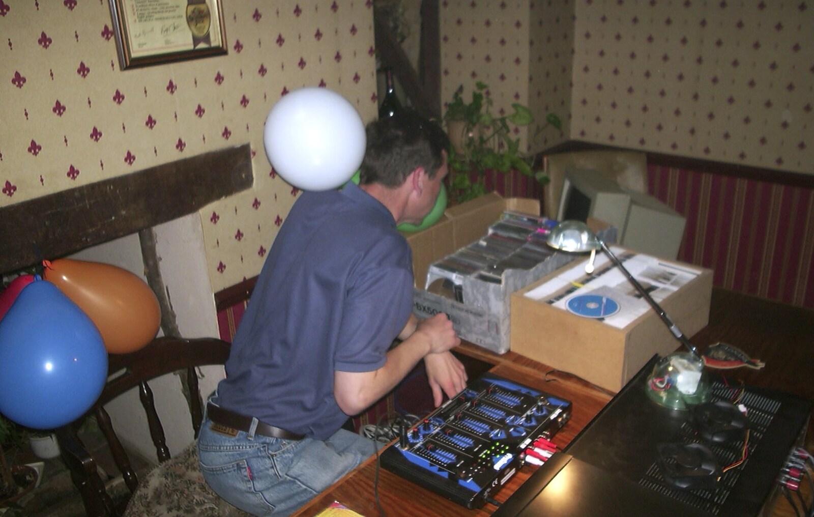 Apple checks the CDs out from Neil's 30th Birthday at the Swan Inn, Brome, Suffolk - 5th April 2003