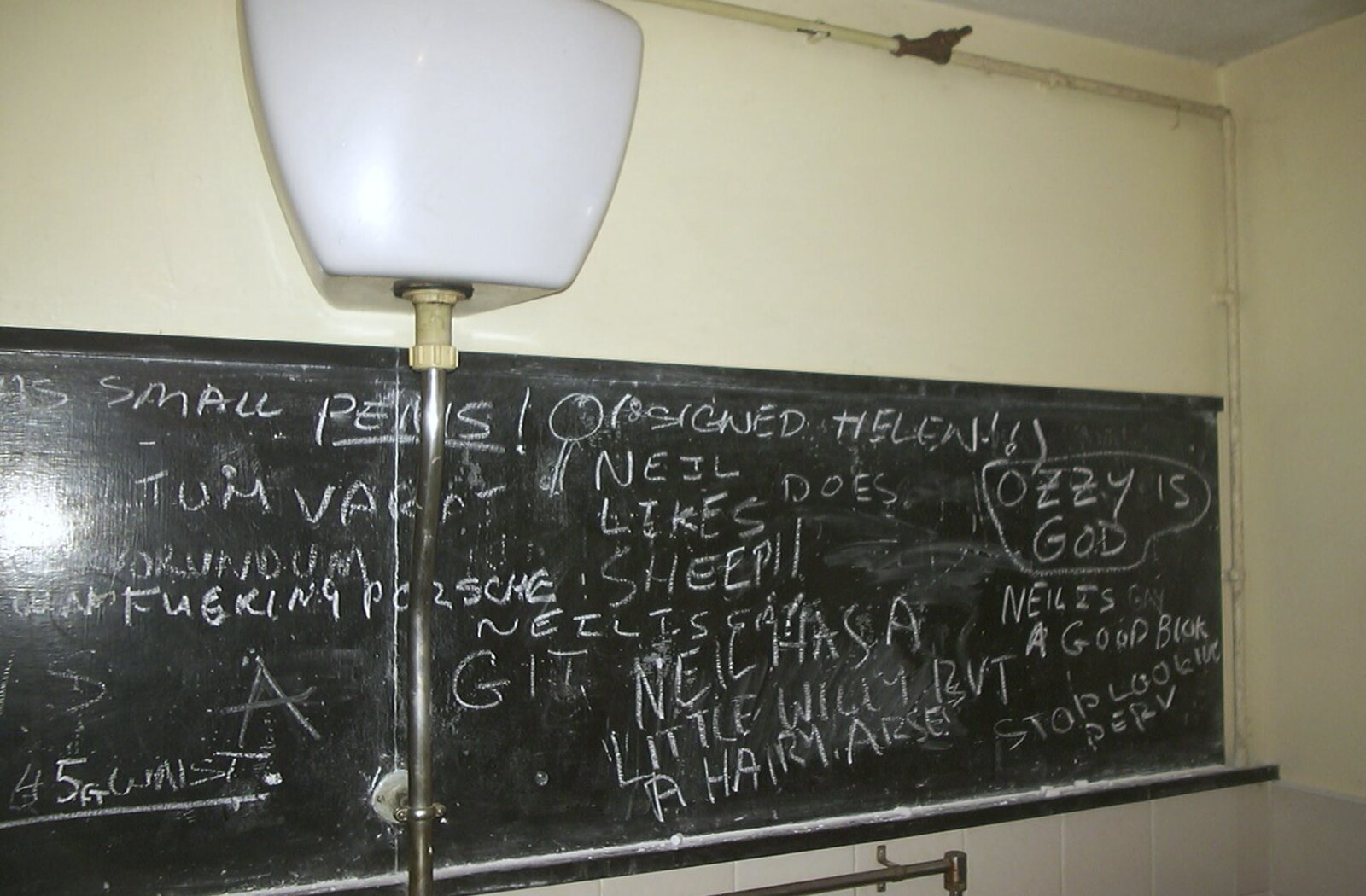 Neil's 30th Birthday at the Swan Inn, Brome, Suffolk - 5th April 2003: The blackboard in the bogs has been busy