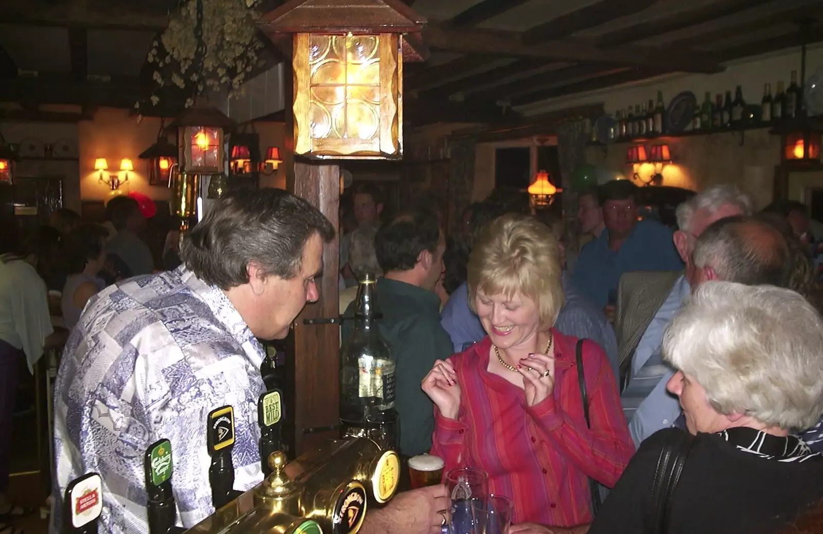 Alan serves some beer, from Spammy's 50th Birthday at the Swan Inn, Brome, Suffolk - 26th April 2003