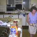 2003 Sylvia works in the kitchen