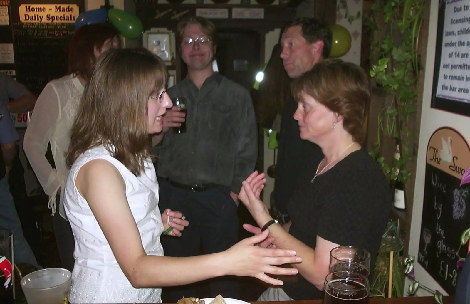 Suey talks animatedly to Pippa, from Spammy's 50th Birthday at the Swan Inn, Brome, Suffolk - 26th April 2003