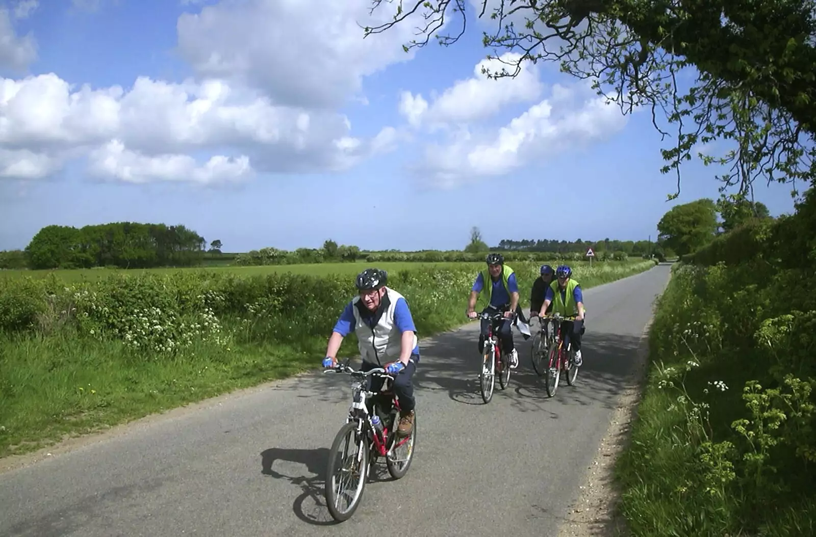 'Bomber' Langdon heads the second group, from The BSCC Bike Ride Weekend, Kelling, Norfolk - 9th May 2003