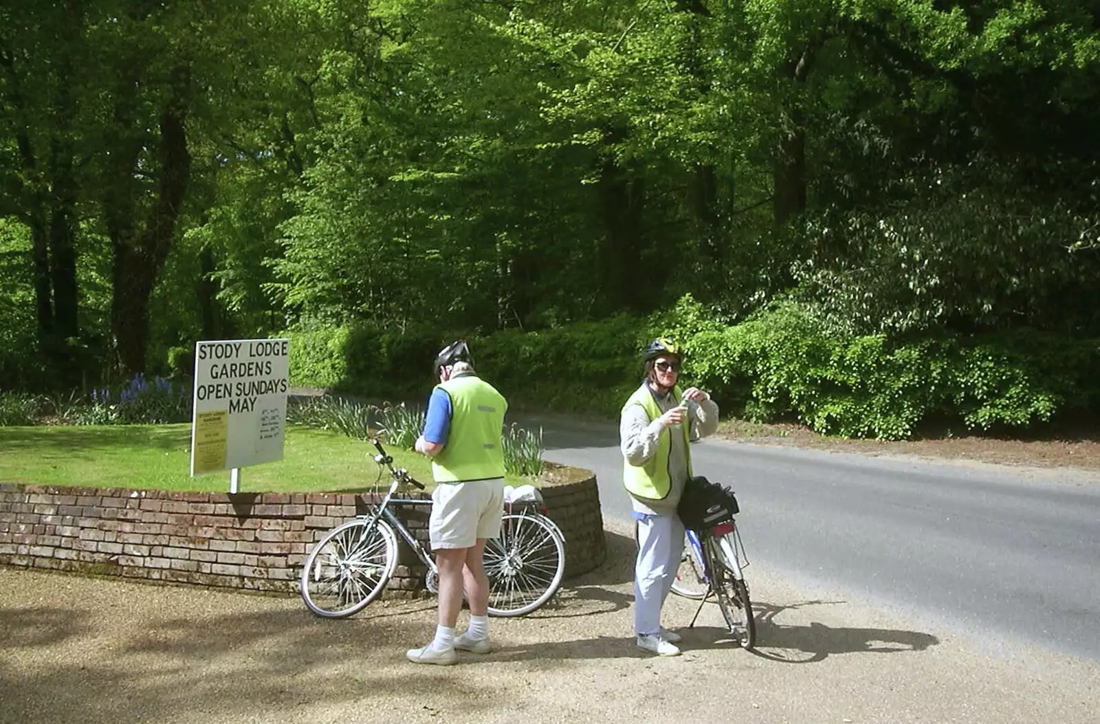 Colin and Jill pause for a drink, from The BSCC Bike Ride Weekend, Kelling, Norfolk - 9th May 2003