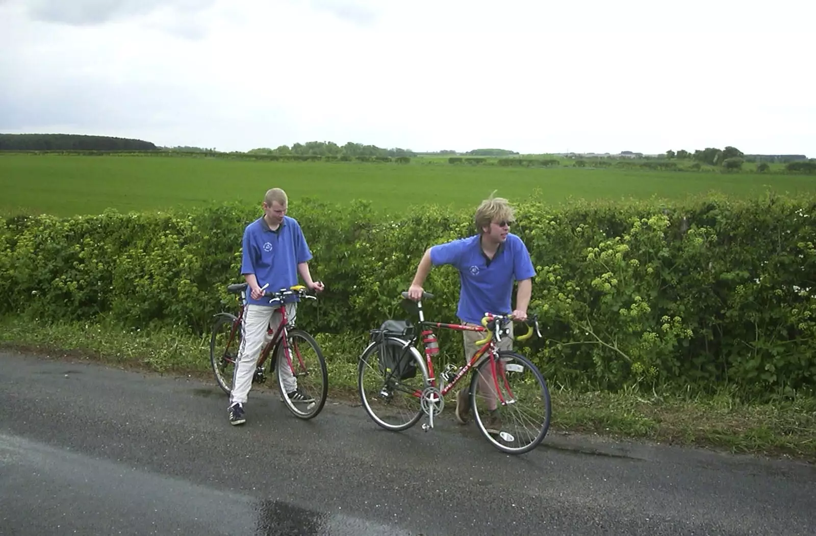 Bill and Marc on a wet road, from The BSCC Bike Ride Weekend, Kelling, Norfolk - 9th May 2003