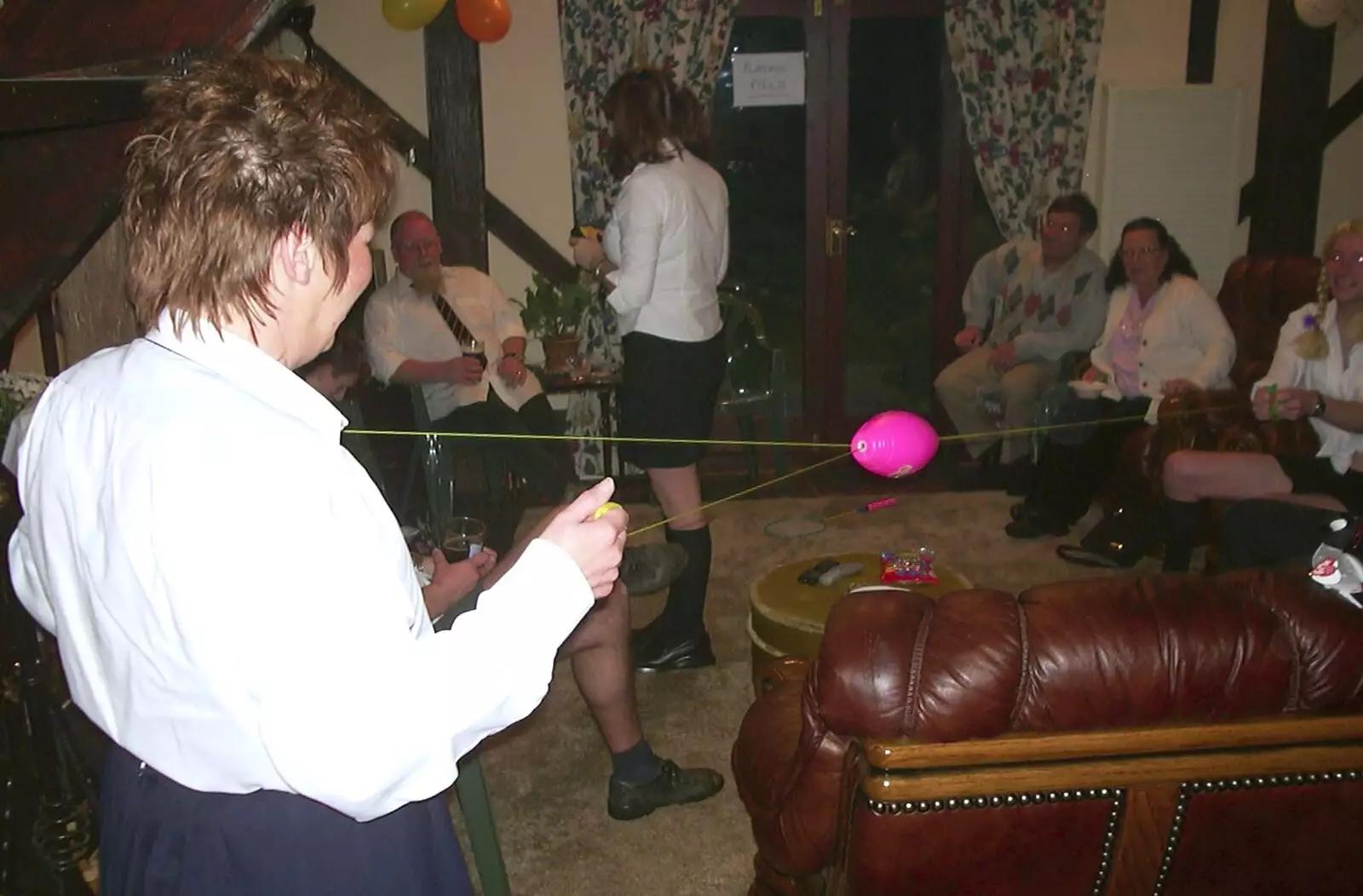 A game of string-pull ball thing occurs, from Jenny's School Disco, Thrandeston, Suffolk - 17th May 2003