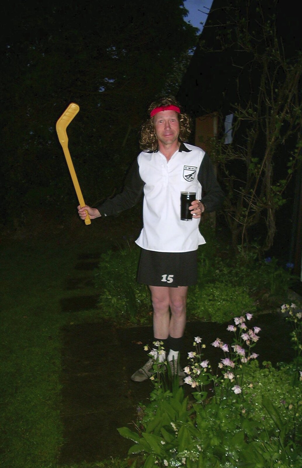 Apple waves around a hockey stick from Jenny's School Disco, Thrandeston, Suffolk - 17th May 2003