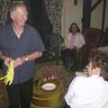 John Willy gets the rubber gloves out, Jenny's School Disco, Thrandeston, Suffolk - 17th May 2003