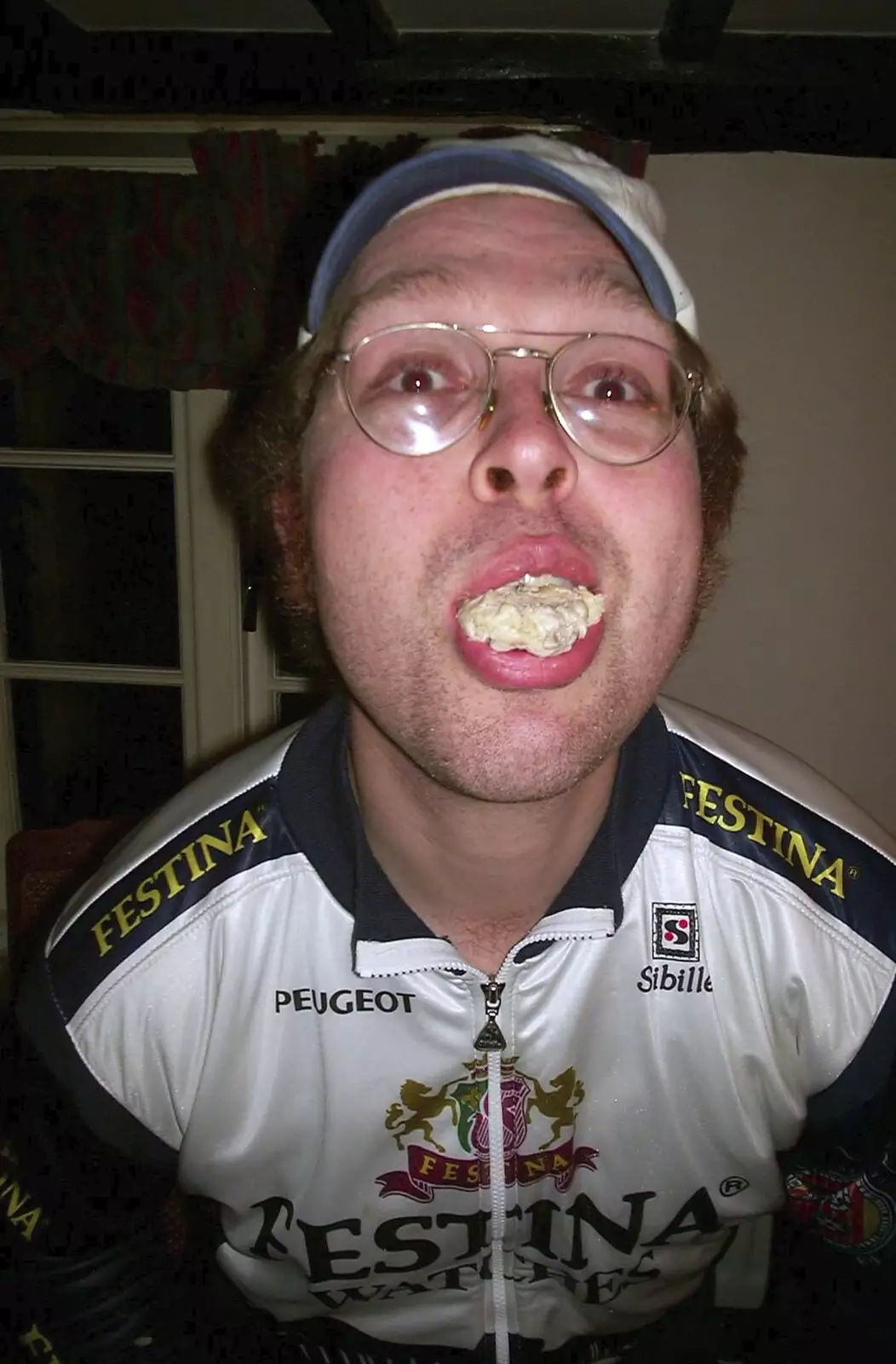 Marc shows off some food, from Jenny's School Disco, Thrandeston, Suffolk - 17th May 2003