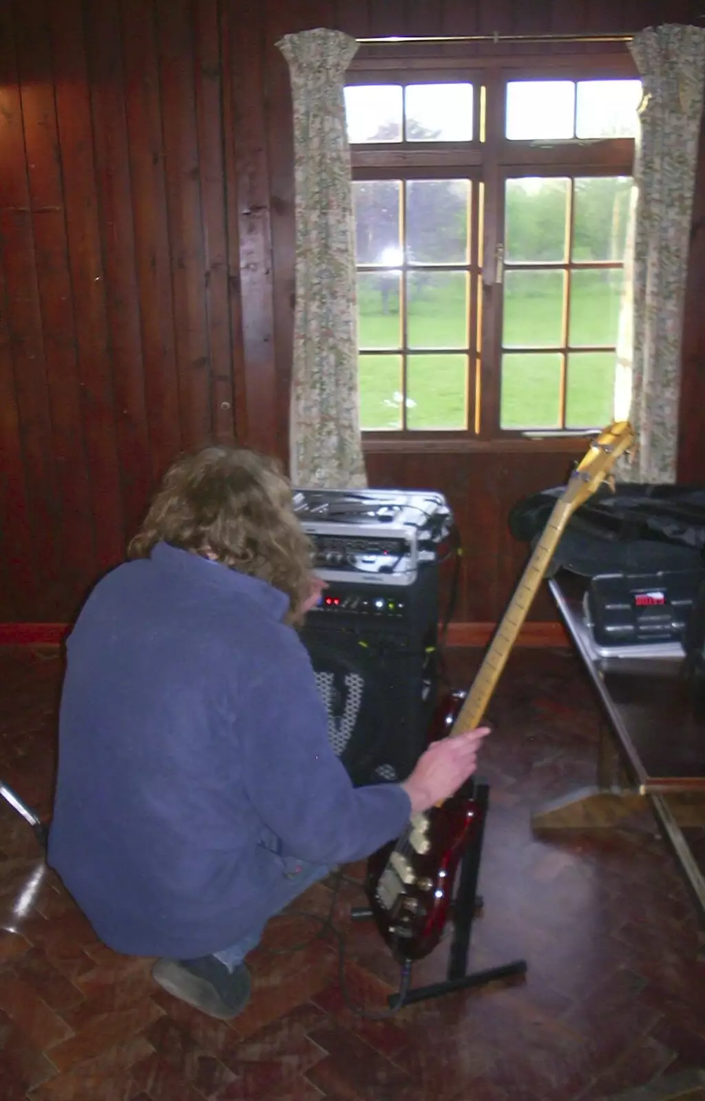 Max sorts out his bass guitar amplifier, from The BBs at BOCM Pauls Pavillion, Burston, Norfolk - 20th May 2003