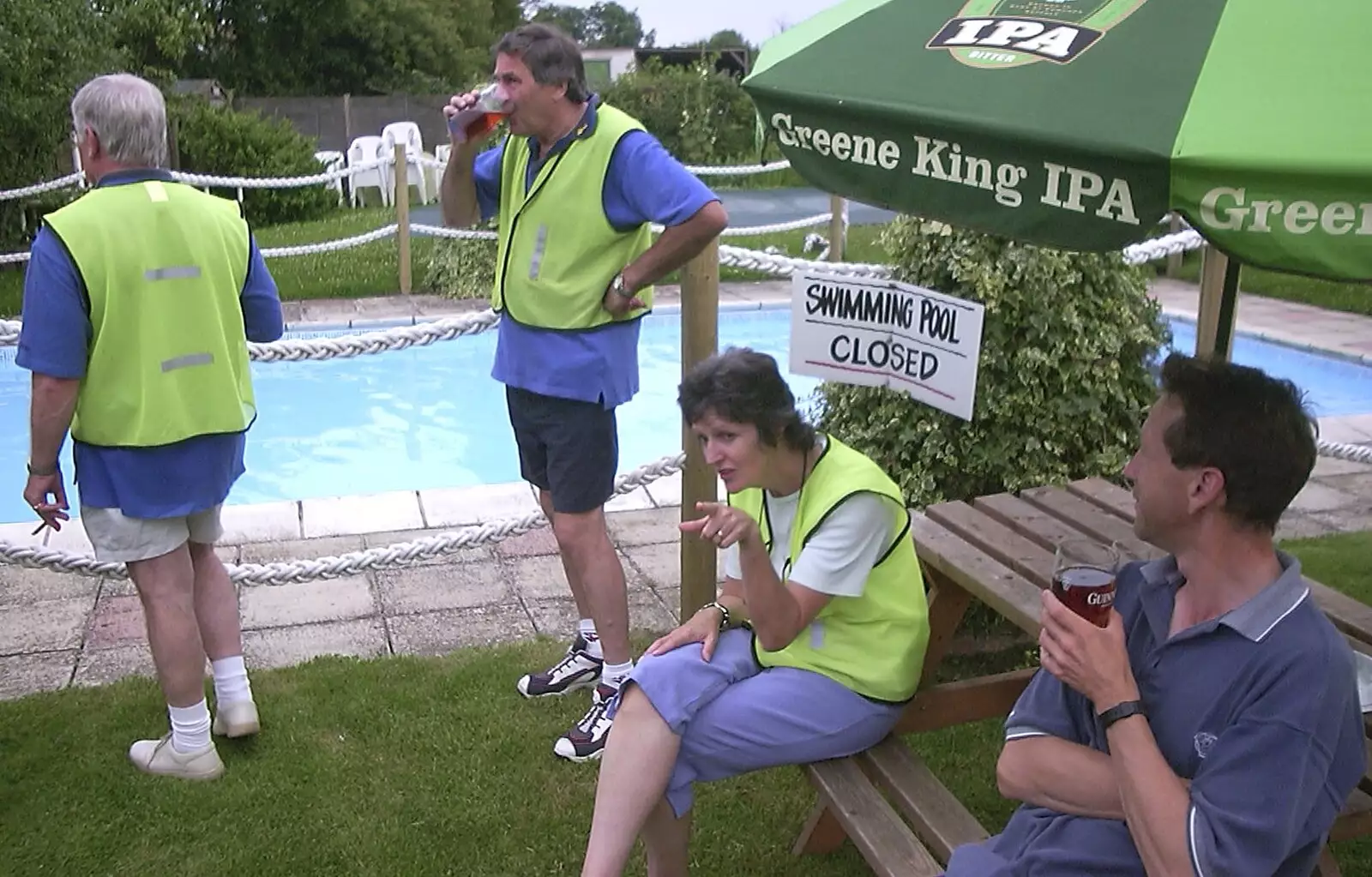 Alan has a slurp in front of the swimming pool, from Ipswich Music Day and the BSCC in Cotton, Suffolk - 6th July 2003