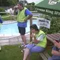 Alan has a slurp in front of the swimming pool, Ipswich Music Day and the BSCC in Cotton, Suffolk - 6th July 2003