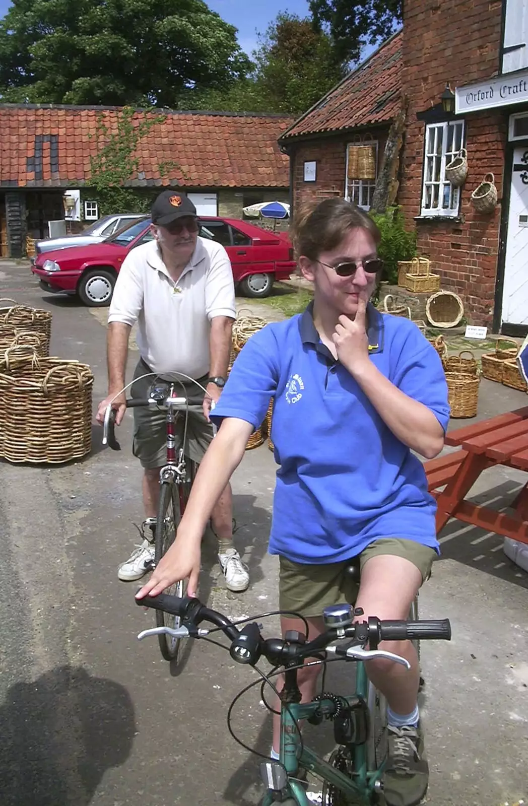 Sue looks bashful, from The BSCC Annual Bike Ride, Orford, Suffolk - 12th July 2003