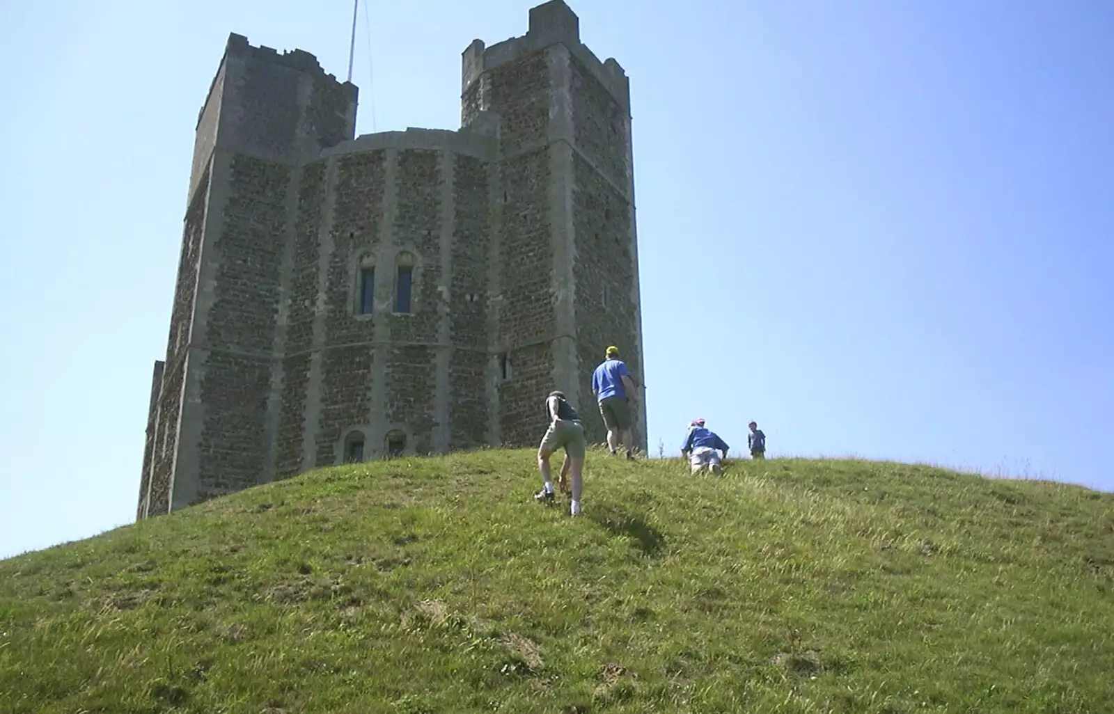 DH, Bill, Marc and Sue climb up the motte, from The BSCC Annual Bike Ride, Orford, Suffolk - 12th July 2003