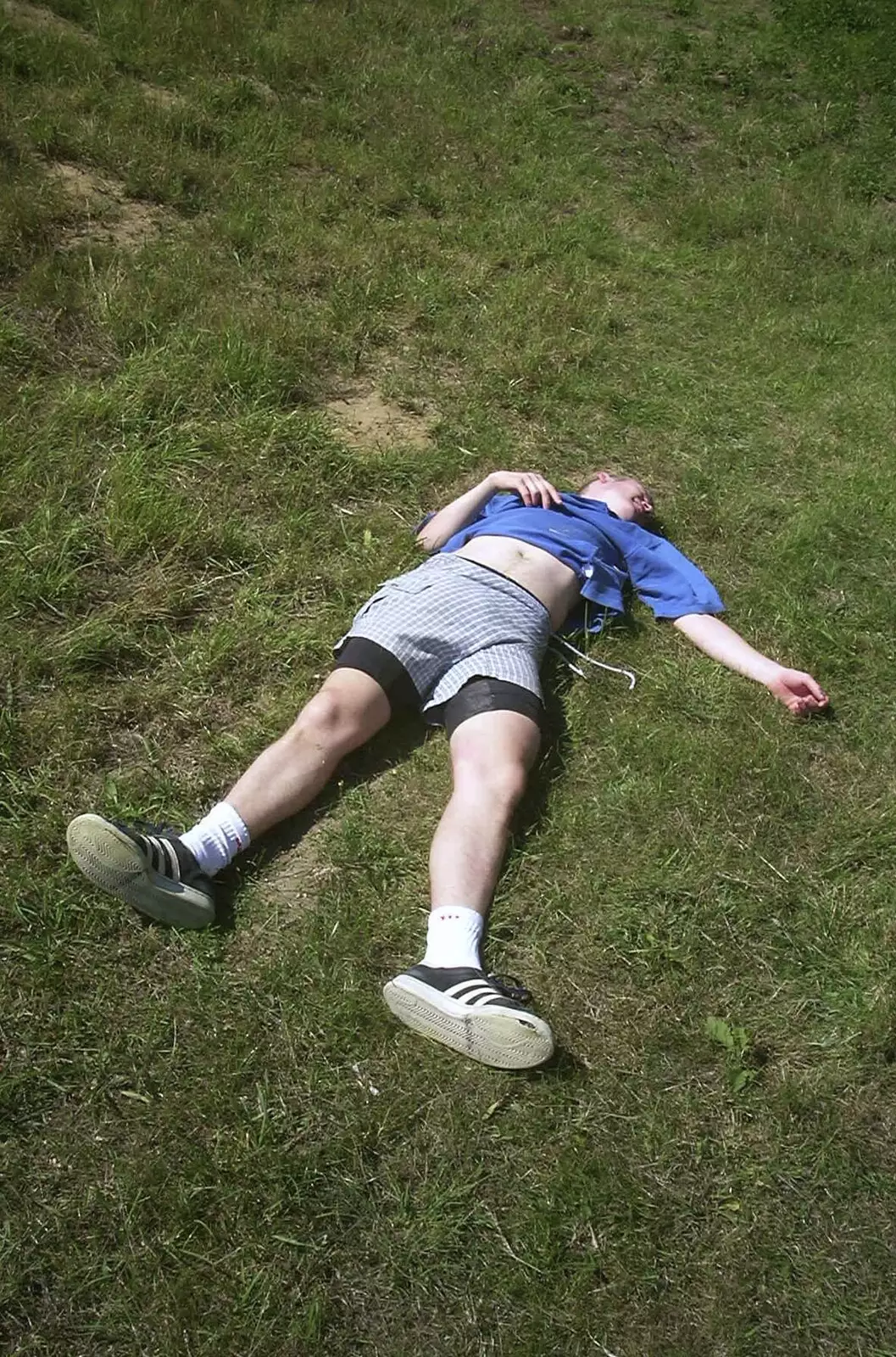 Bill flakes out after rolling down the hill, from The BSCC Annual Bike Ride, Orford, Suffolk - 12th July 2003