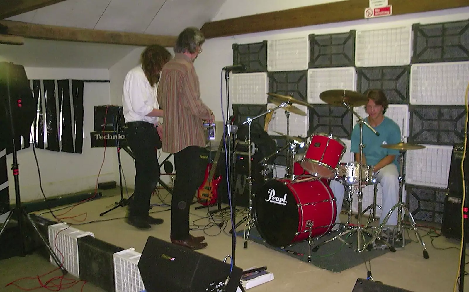 Danny sits behind his drum kit, from The BBs at Great Ellingham, Norfolk - 18th July 2003