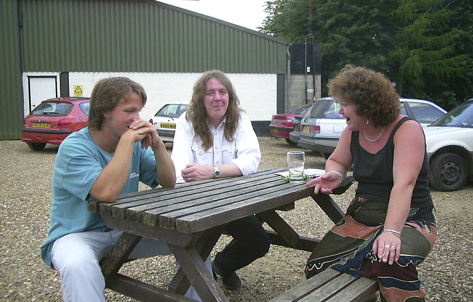 Danny, Max and Jo chat on a bench from The BBs at Great Ellingham, Norfolk - 18th July 2003