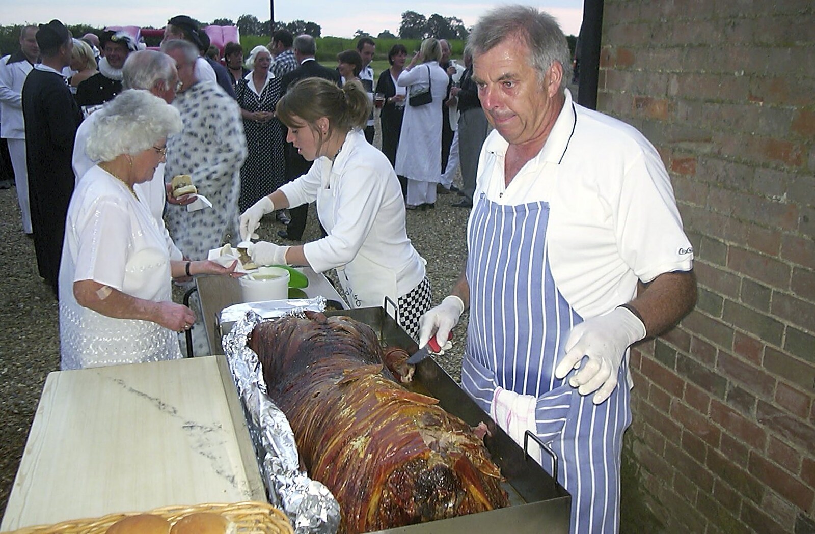 The hog roast occurs from The BBs at Great Ellingham, Norfolk - 18th July 2003