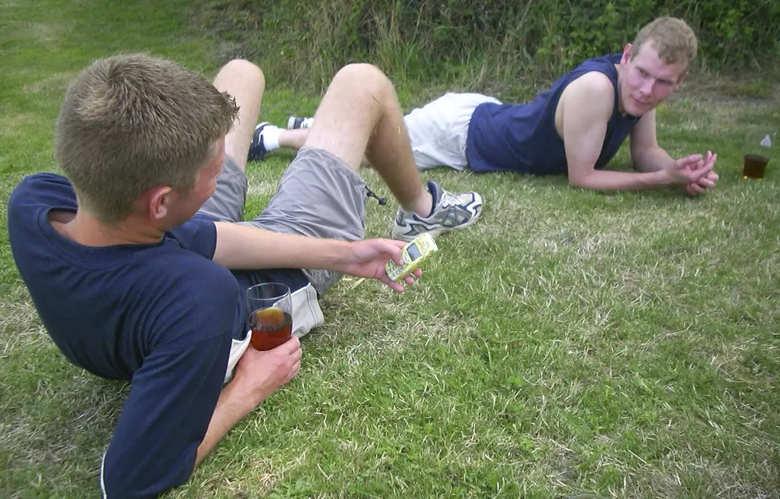 The Boy Phil on his Nokia, from A BSCC Camping Trip to the Fox Inn, Shadingfield, Suffolk - 9th August 2003