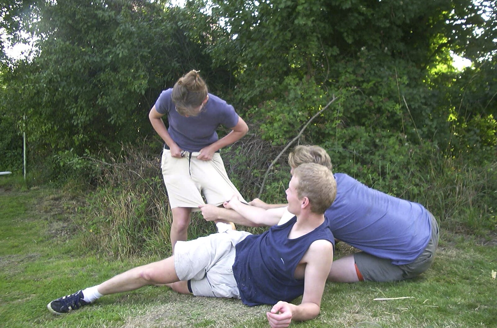 Bill and Marc try to pull Suey's shorts off from A BSCC Camping Trip to the Fox Inn, Shadingfield, Suffolk - 9th August 2003