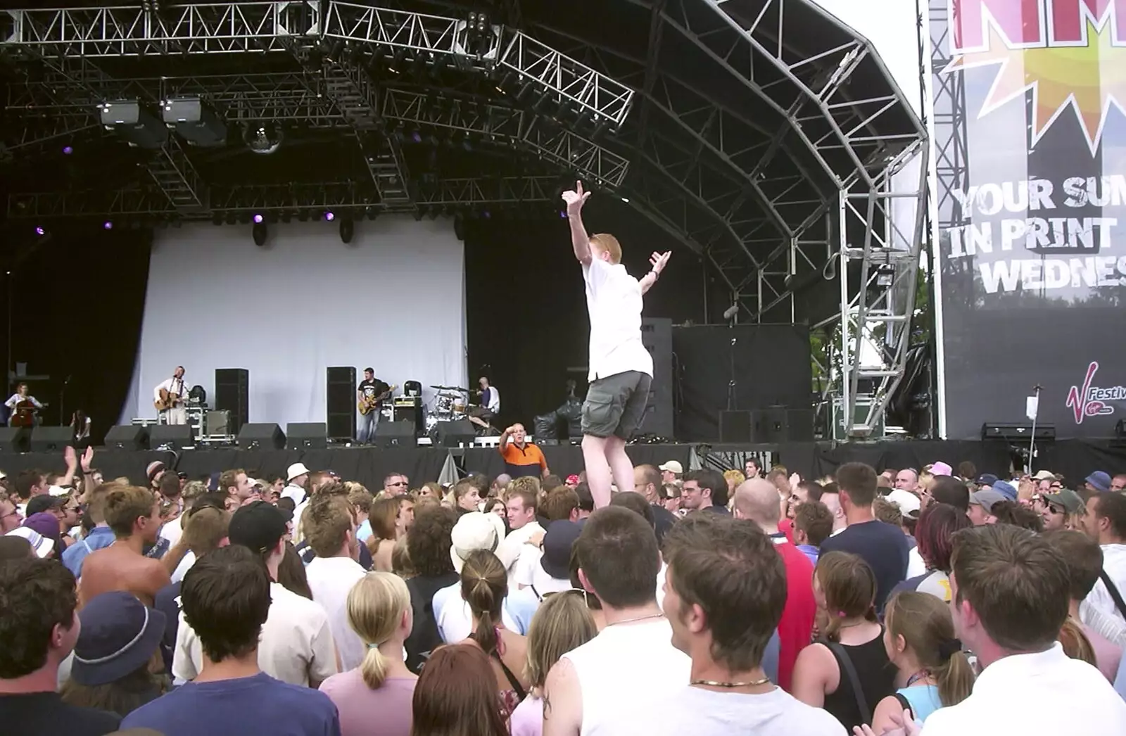 Someone's in mid-air for Damian Rice, from V Festival 2003, Hyland's Park, Chelmsford, Essex - 16th August 2003