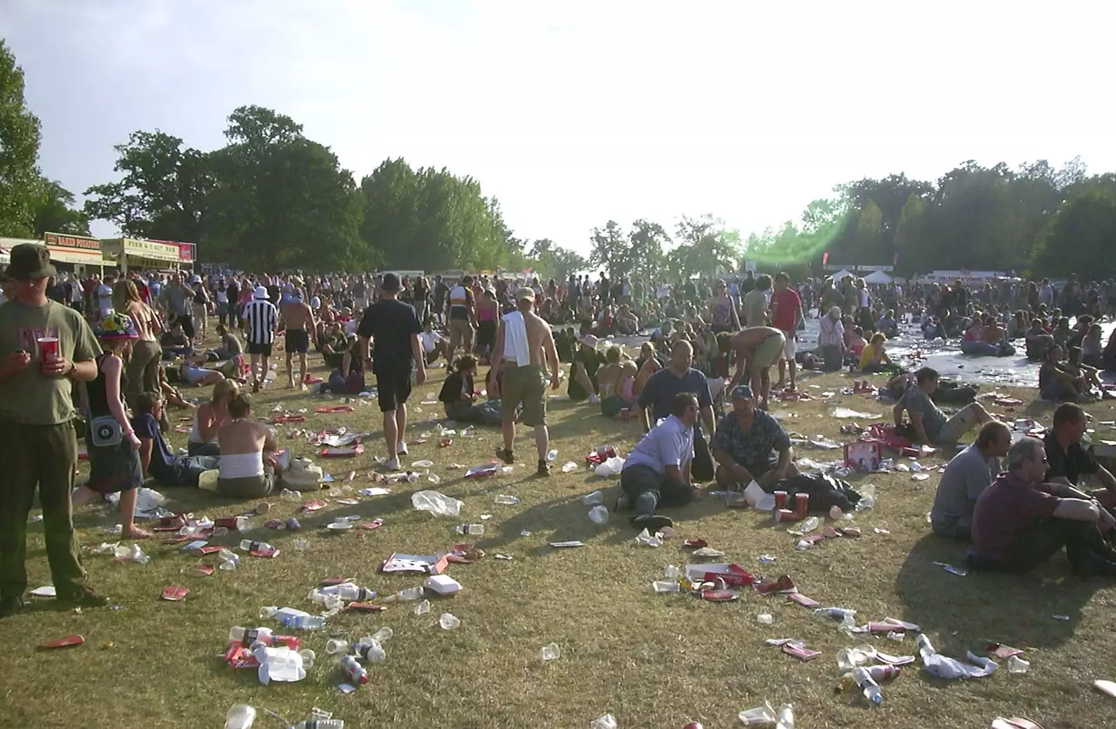 The mess builds up, and it's only the afternoon, from V Festival 2003, Hyland's Park, Chelmsford, Essex - 16th August 2003