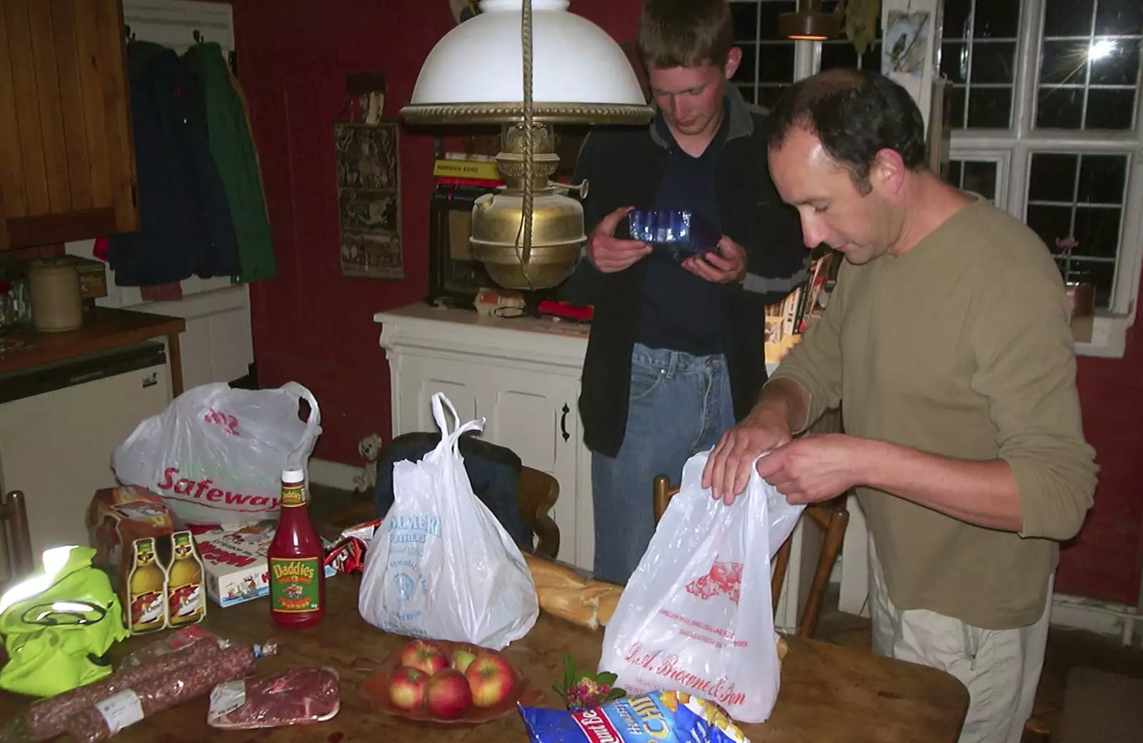 DH looks in a Browne's carrier bag, from Wavy's Monday Czech Fry-Up, Thrandeston, Suffolk - 25th August 2003