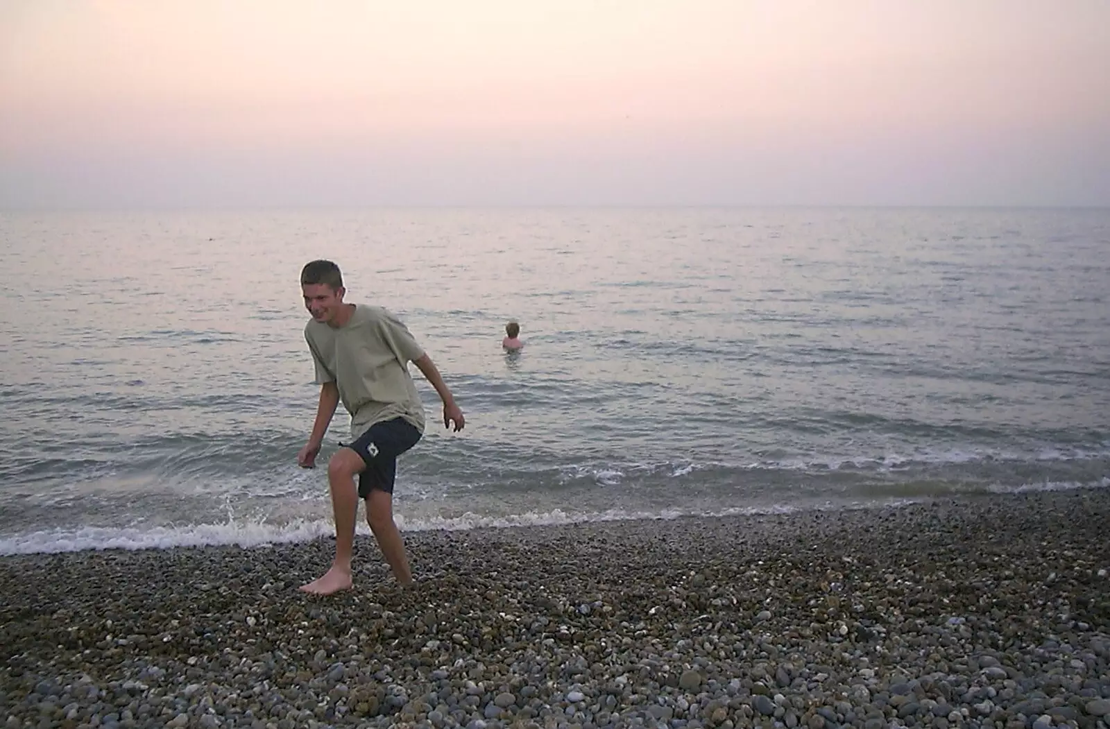 Wavy's in the sea, as Phil legs it, from Fish and Chips on the Beach, Aldeburgh, Suffolk - 12th September 2003