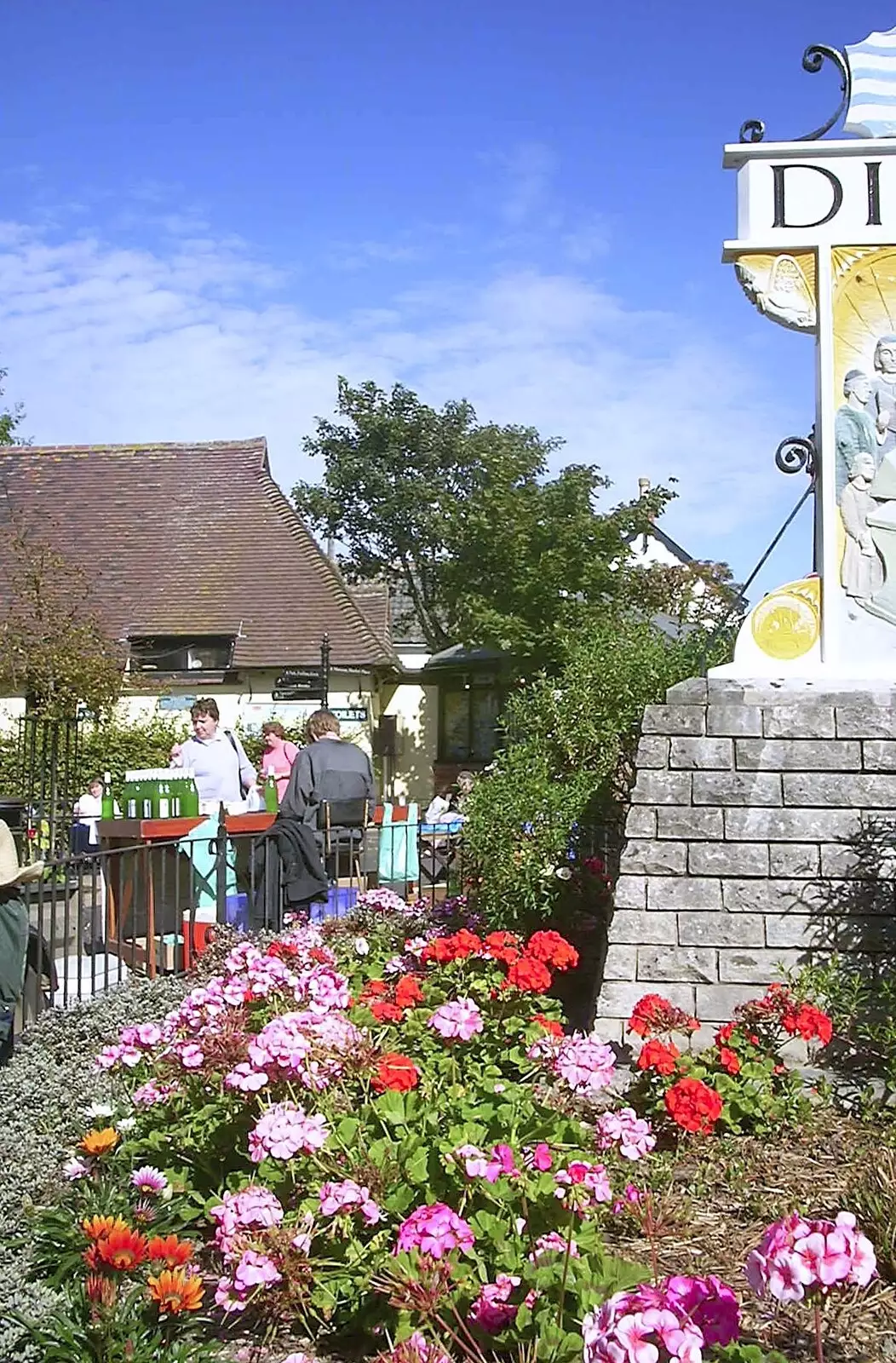 Late summer flowers, and the Diss sign, from Ten Pin Bowling, Norwich, Norfolk - 13th September 2003